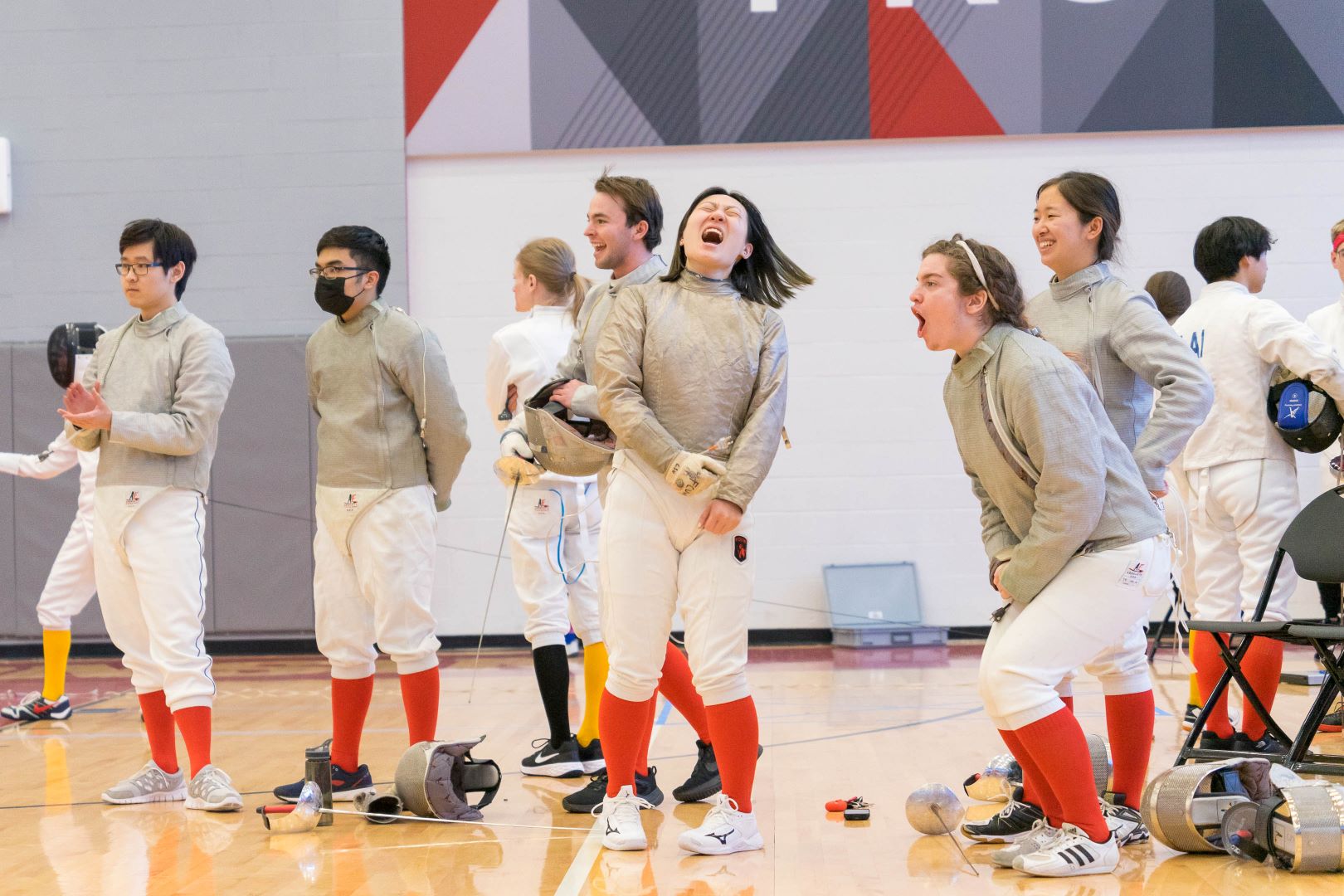 men's sabre flunges at opponent